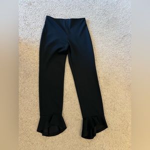 Black pants with cuffed ankles. Size S.